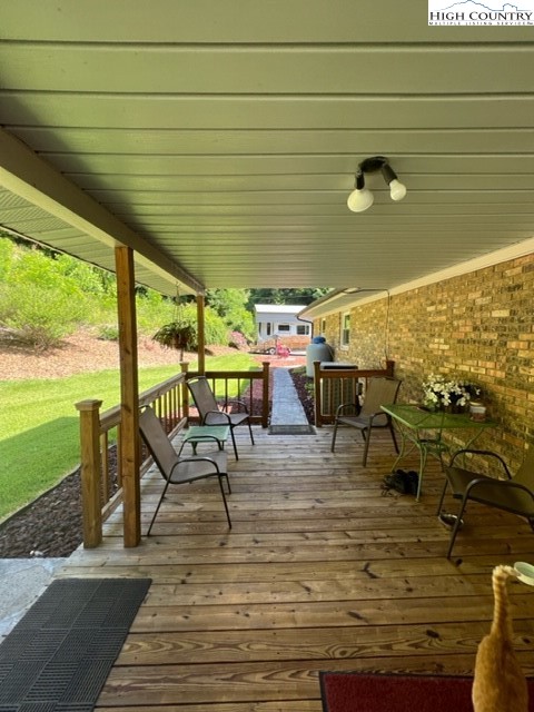 191 Welch Road Lansing, NC 28643 - Photo 32 of 41 a view of a terrace with chairs