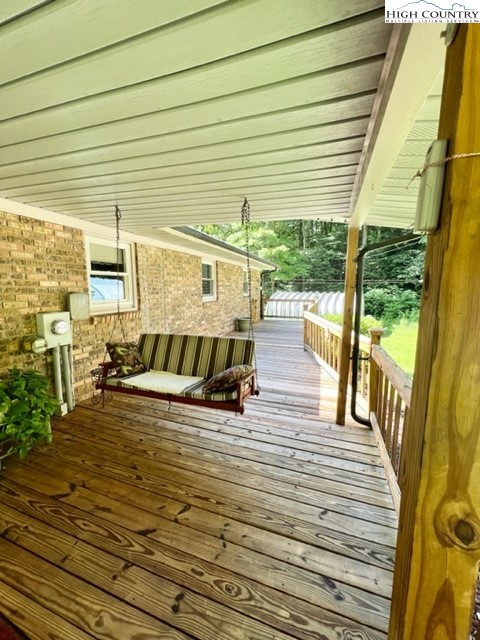 191 Welch Road Lansing, NC 28643 - Photo 33 of 41 a view of a swimming pool with seating space
