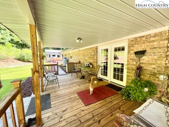 191 Welch Road Lansing, NC 28643 - Photo 34 of 41 a view of a patio with wooden floor