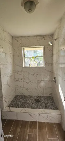 a bathroom with a toilet and a sink