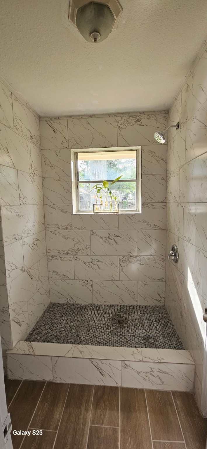 4102 California Avenue Dickinson, TX 77539 - Photo 12 of 19 a bathroom with a window