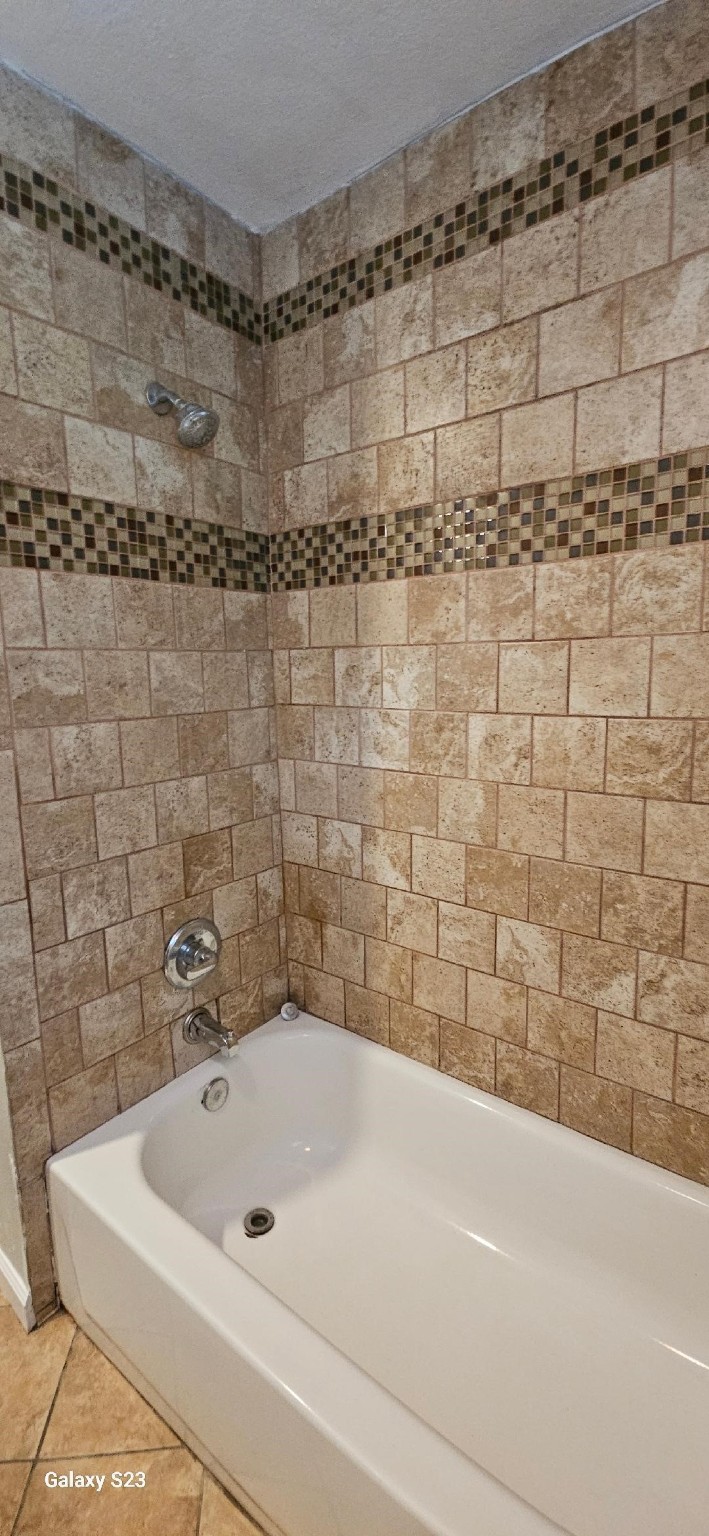 4102 California Avenue Dickinson, TX 77539 - Photo 14 of 19 a bathroom with a bathtub