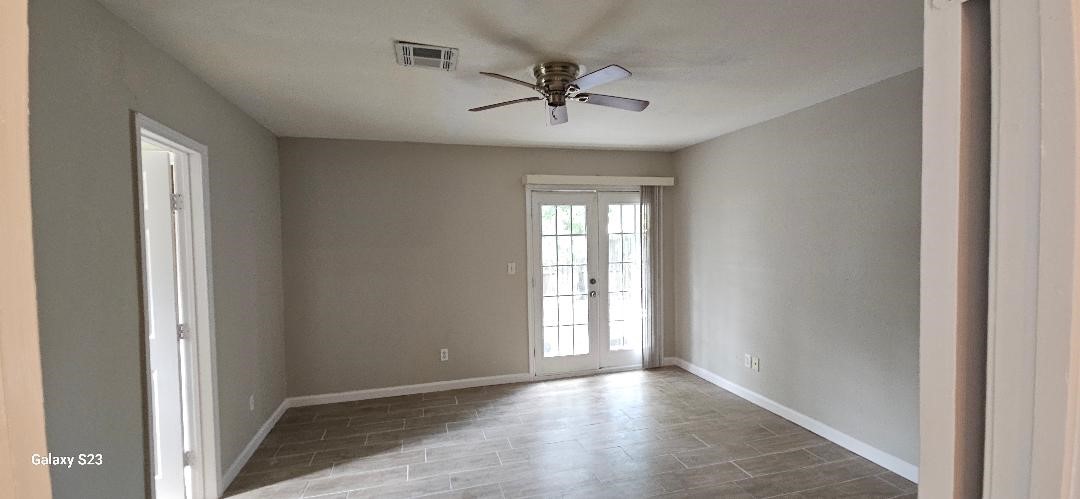4102 California Avenue Dickinson, TX 77539 - Photo 8 of 19 a view of an empty room with a window