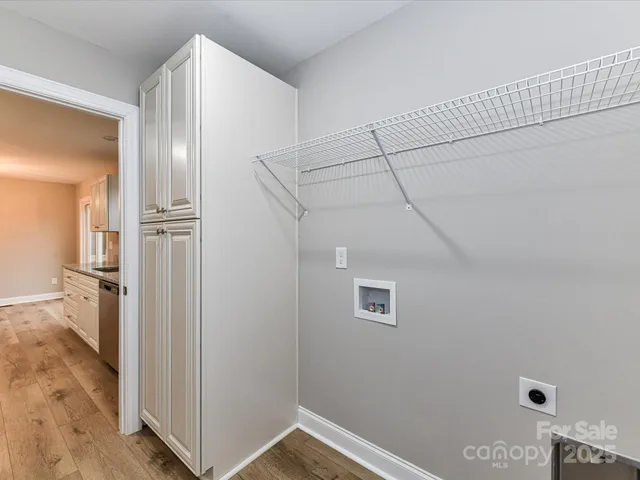 a view of balcony with wooden floor