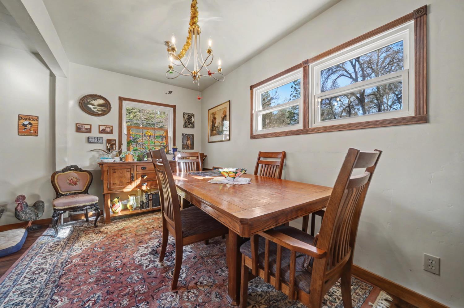 3341 Newtown Road Placerville, CA 95667 - Photo 12 of 49 a view of a dining room with furniture window and wooden floor
