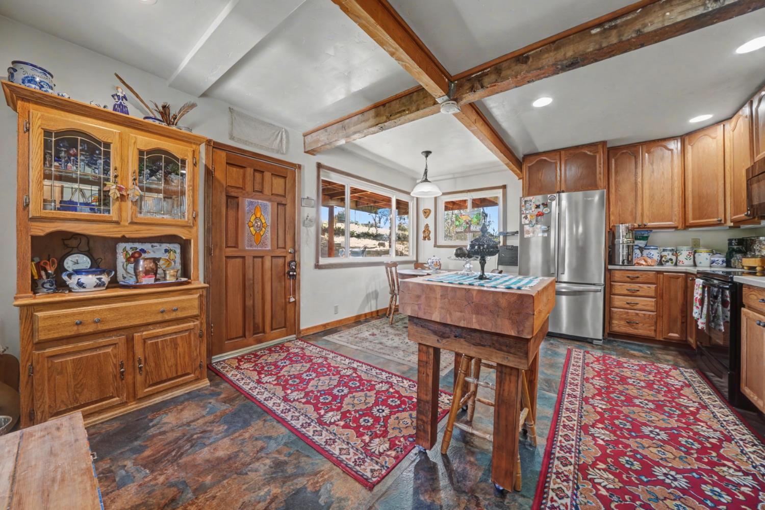 3341 Newtown Road Placerville, CA 95667 - Photo 13 of 49 a living room with stainless steel appliances granite countertop furniture wooden floor and a rug