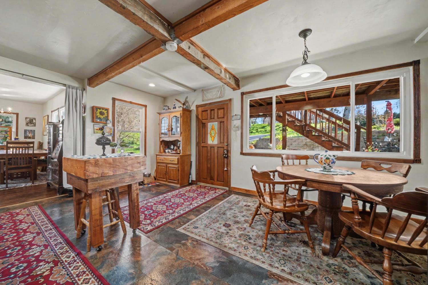 3341 Newtown Road Placerville, CA 95667 - Photo 16 of 49 a view of a dining room with furniture window and wooden floor