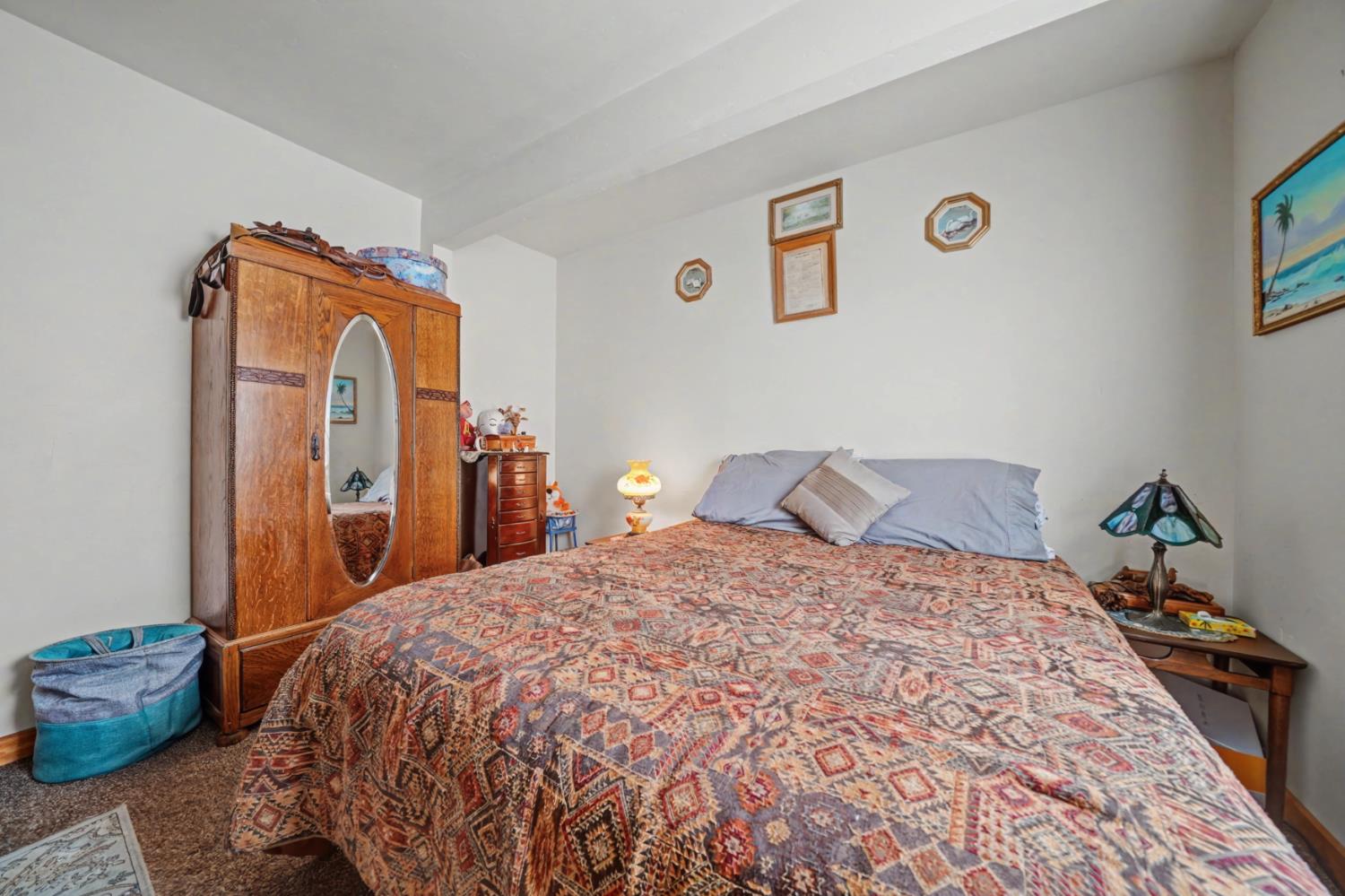 3341 Newtown Road Placerville, CA 95667 - Photo 21 of 49 a bedroom with a bed and a mirror