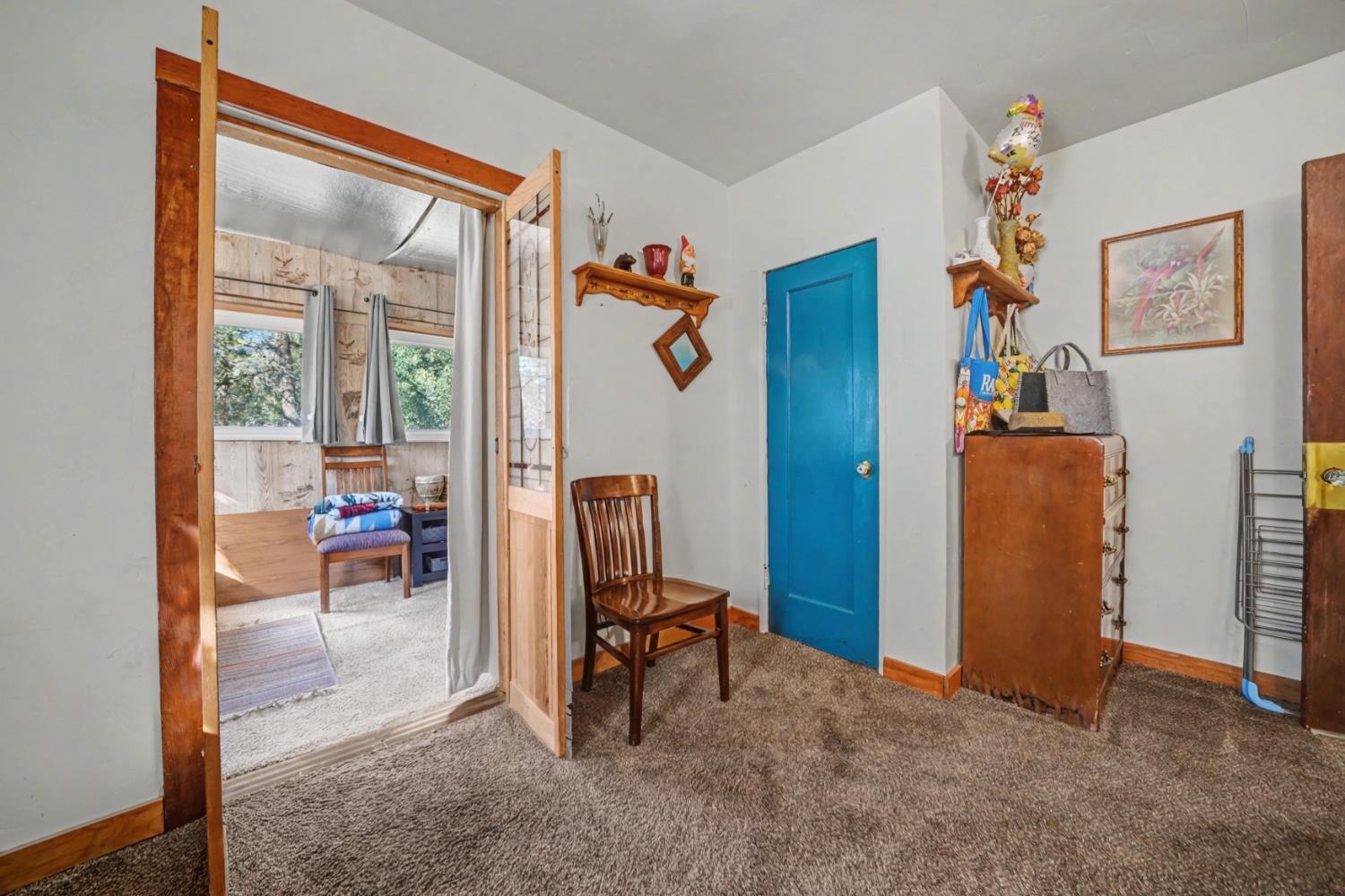 3341 Newtown Road Placerville, CA 95667 - Photo 24 of 49 a view of a livingroom with furniture and a flat screen tv