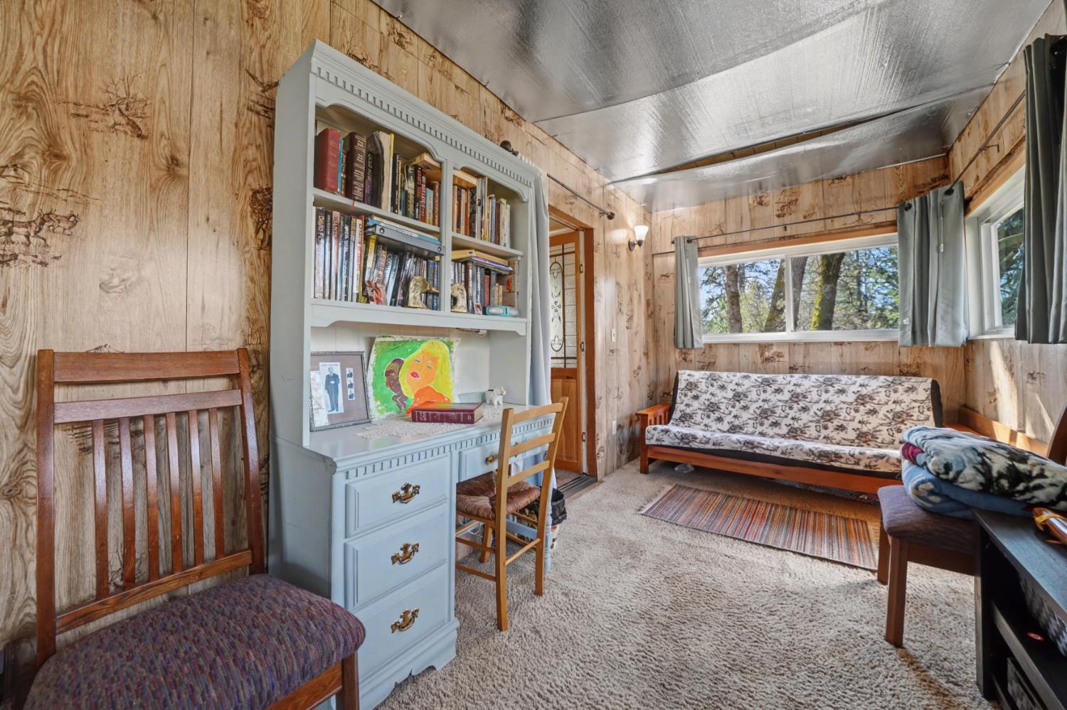 3341 Newtown Road Placerville, CA 95667 - Photo 27 of 49 a bedroom with a bed and a window