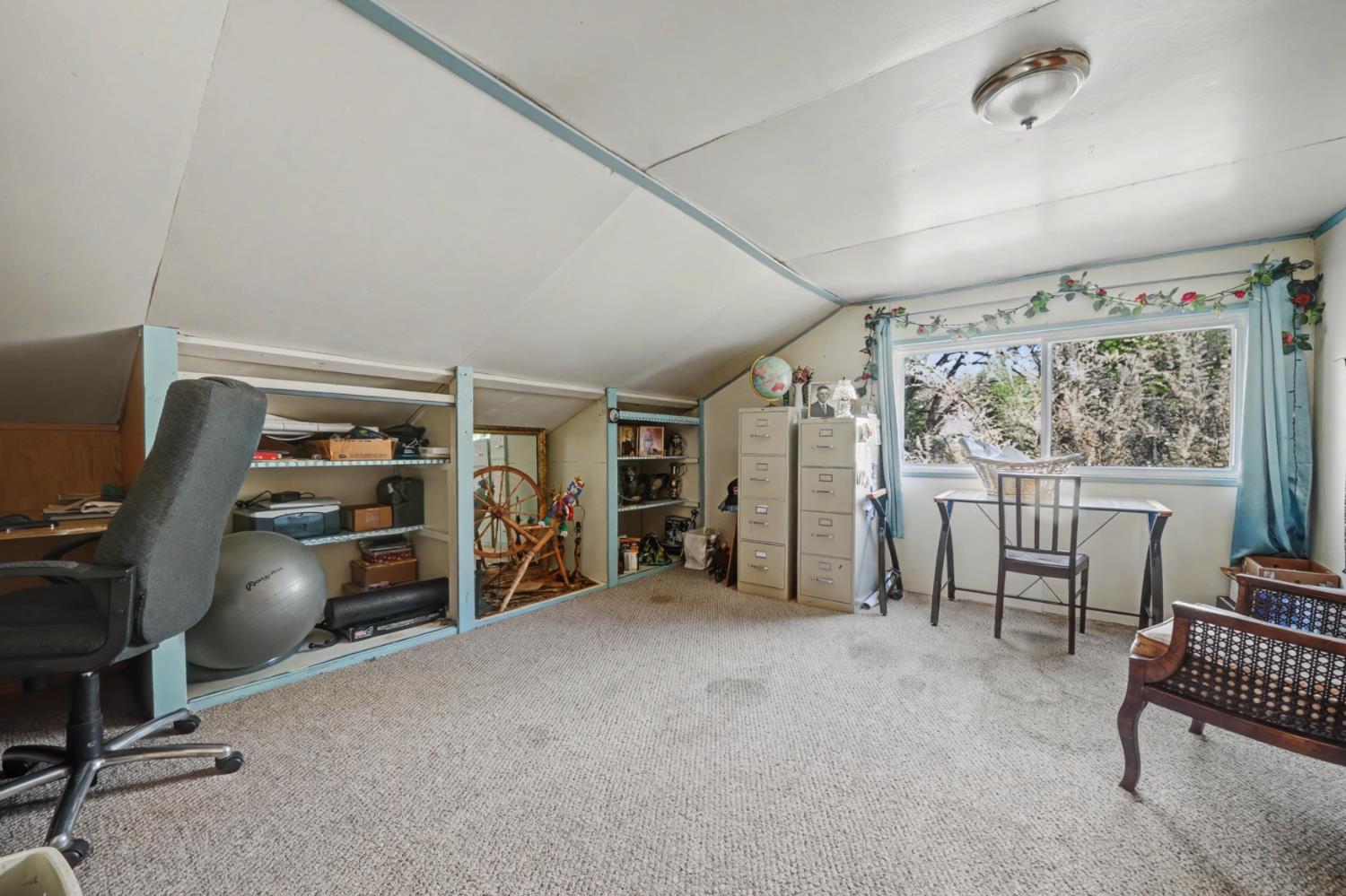 3341 Newtown Road Placerville, CA 95667 - Photo 29 of 49 a view of a livingroom with furniture and a window