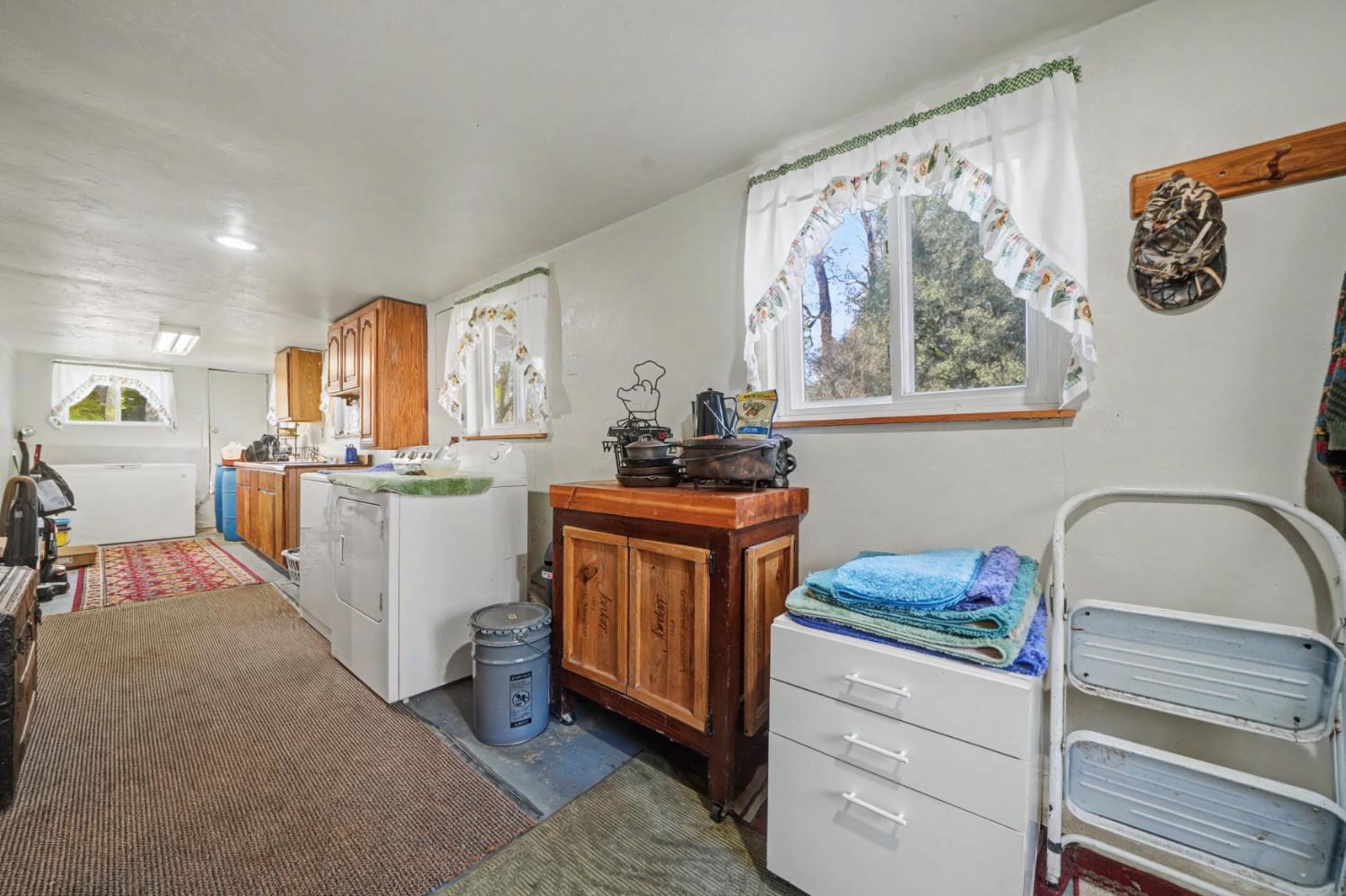 3341 Newtown Road Placerville, CA 95667 - Photo 40 of 49 a kitchen with a refrigerator and a stove top oven