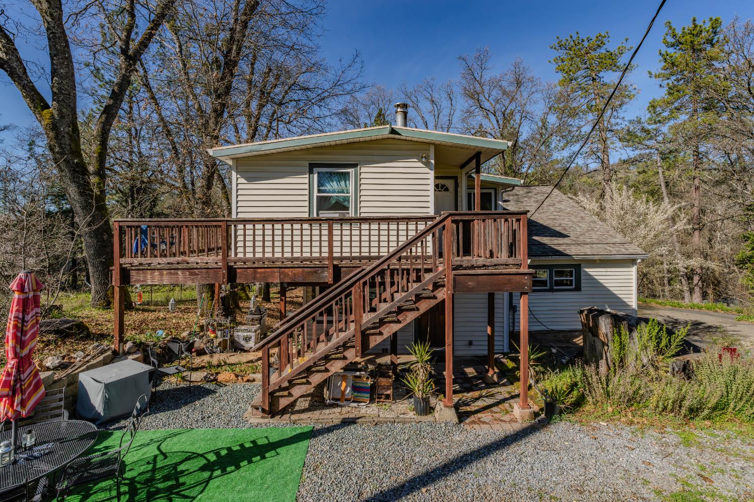 3341 Newtown Road Placerville, CA 95667 - Photo 6 of 49 front view of a house with a small yard