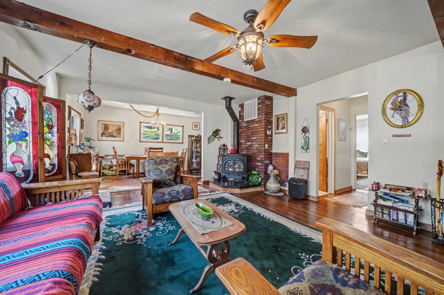 3341 Newtown Road Placerville, CA 95667 - Photo 9 of 49 a living room with furniture and a chandelier