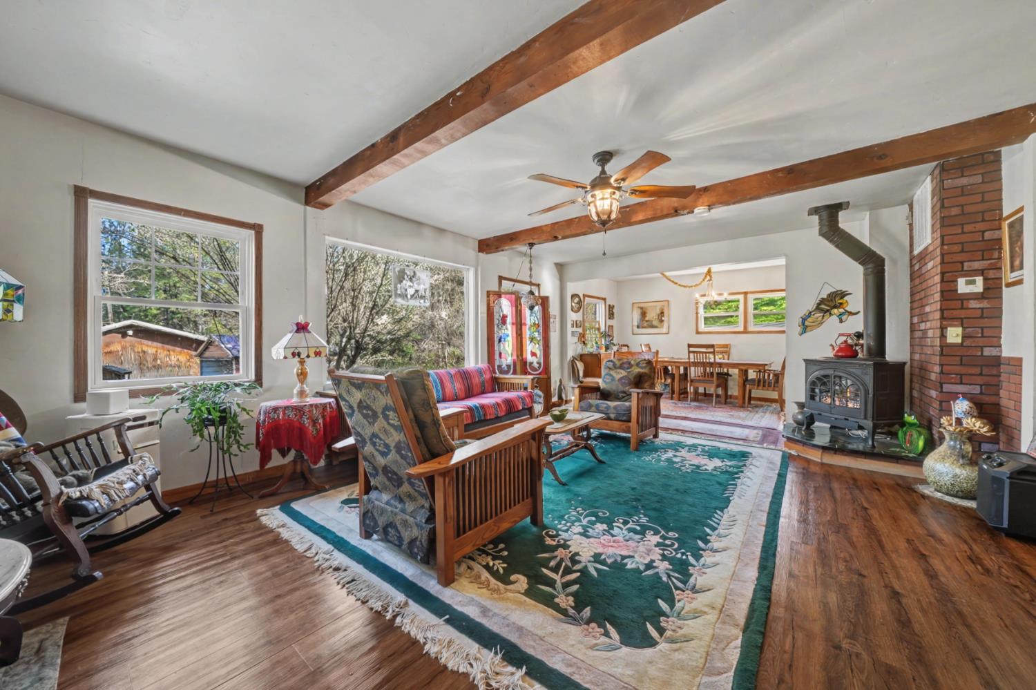 3341 Newtown Road Placerville, CA 95667 - Photo 10 of 49 a living room filled with furniture hardwood floor and a table