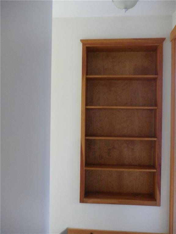 421 Bluff Road Northport, ME 04849 - Photo 12 of 19 Built In Bookcase In Hall