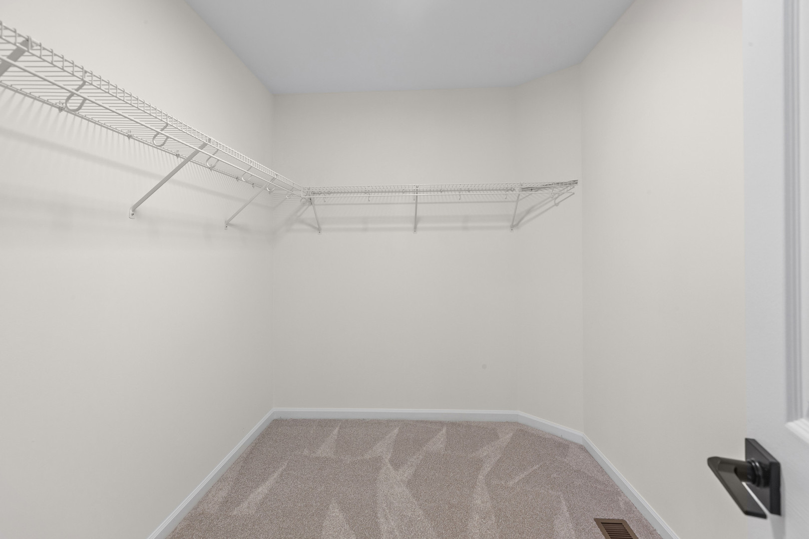 2607 Lexington Lane Naperville, IL 60540 - Photo 19 of 30 a view of a room with racks on the wall