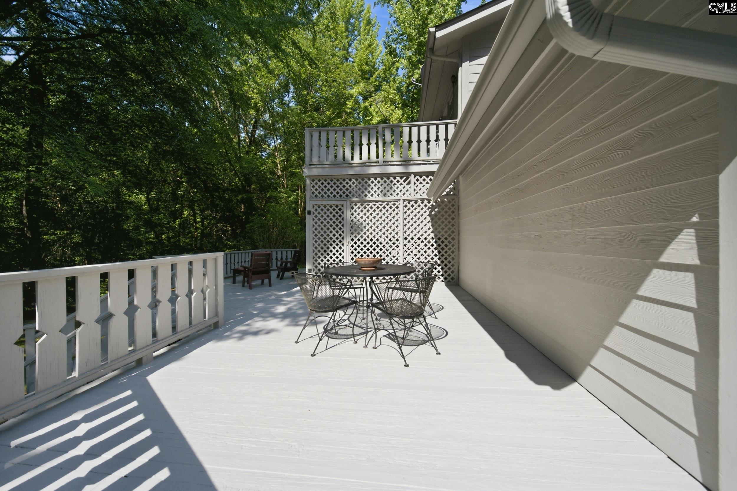 4324 Syrup Mill Road Ridgeway, SC 29130 - Photo 37 of 61 a view of balcony with wooden floor and outdoor seating