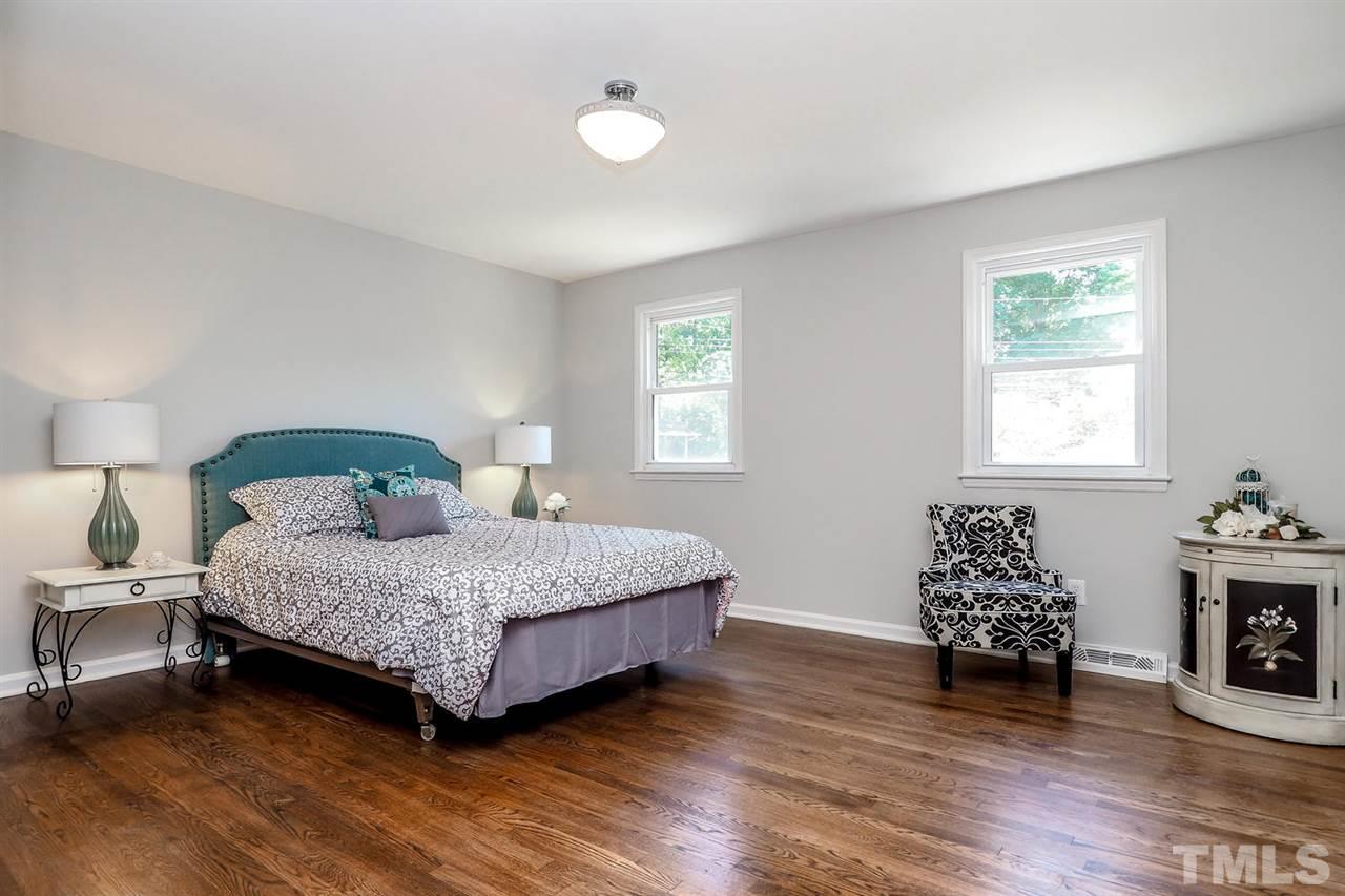 1113 Winona Road Raleigh, NC 27609 - Photo 10 of 25 a bedroom with a bed and a window