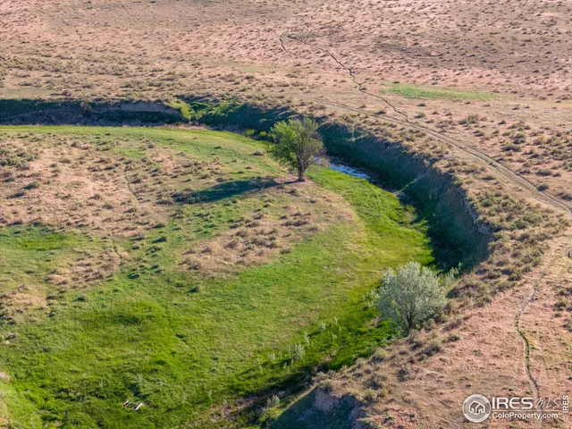 a view of a pathway with a lake view