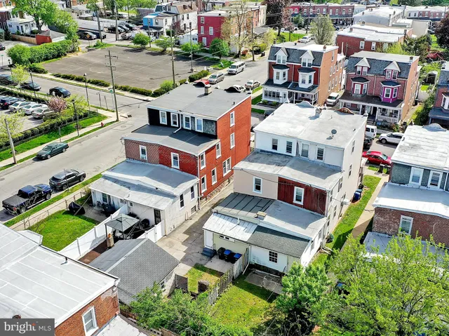 an aerial view of a house with swimming pool