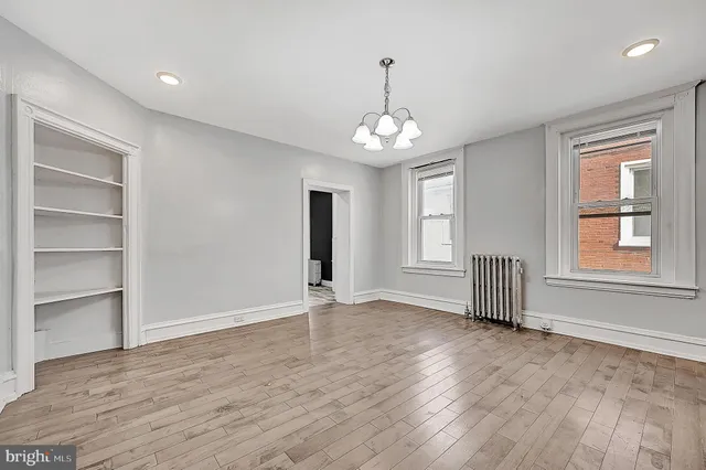 a view of livingroom with hardwood floor and window