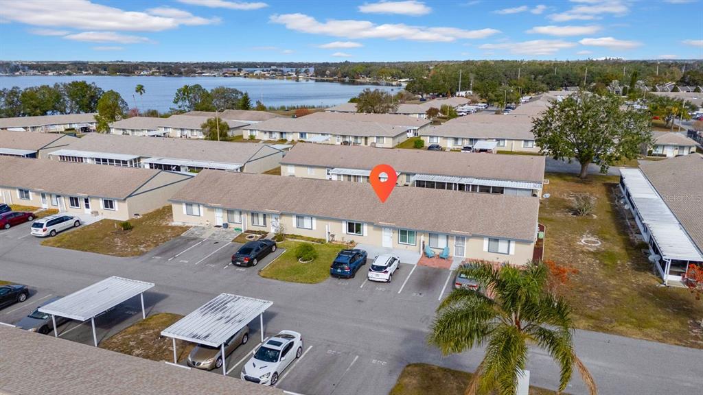 260 Winter Ridge Boulevard, Unit 38 Winter Haven, FL 33881 - Photo 1 of 1 an aerial view of residential houses with outdoor space