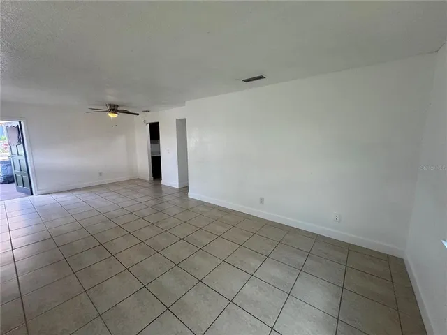 a view of an empty room and window