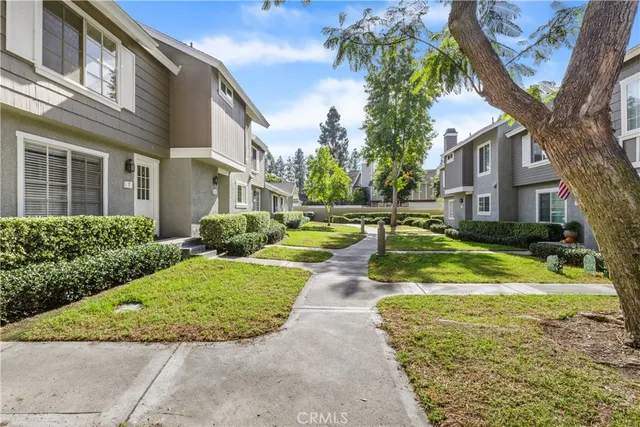 a view of yard with swimming pool