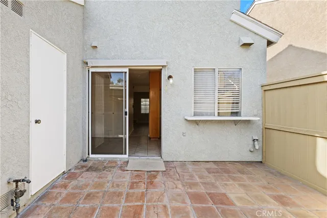 a view of a closet area with an empty room