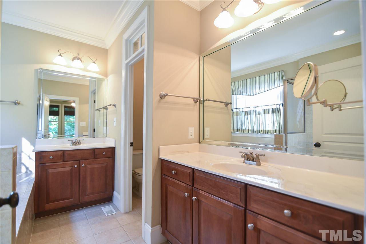 11323 Oakcroft Drive Raleigh, NC 27614 - Photo 12 of 25 First floor half bath with vanity is very convenient for guests.