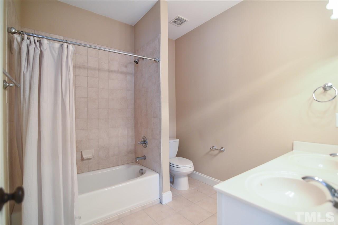 11323 Oakcroft Drive Raleigh, NC 27614 - Photo 21 of 25 Convenient hall bath features vanity and tub/shower combo.