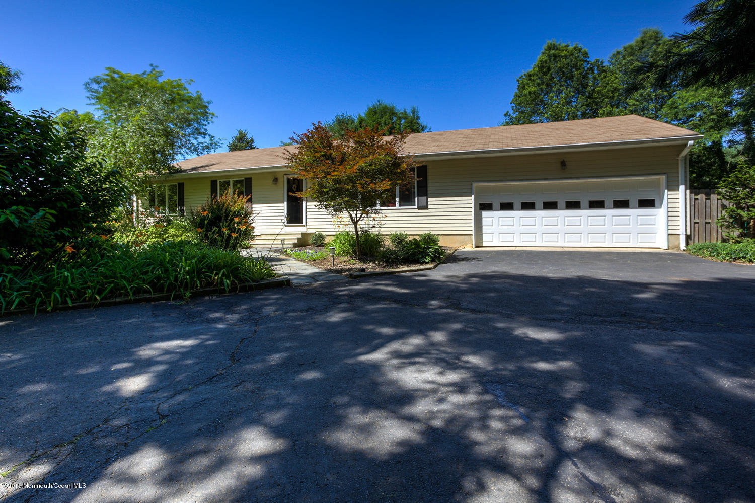 46 Hill Road Allentown, NJ 08501 - Photo 4 of 25 a front view of a house with a yard and garage