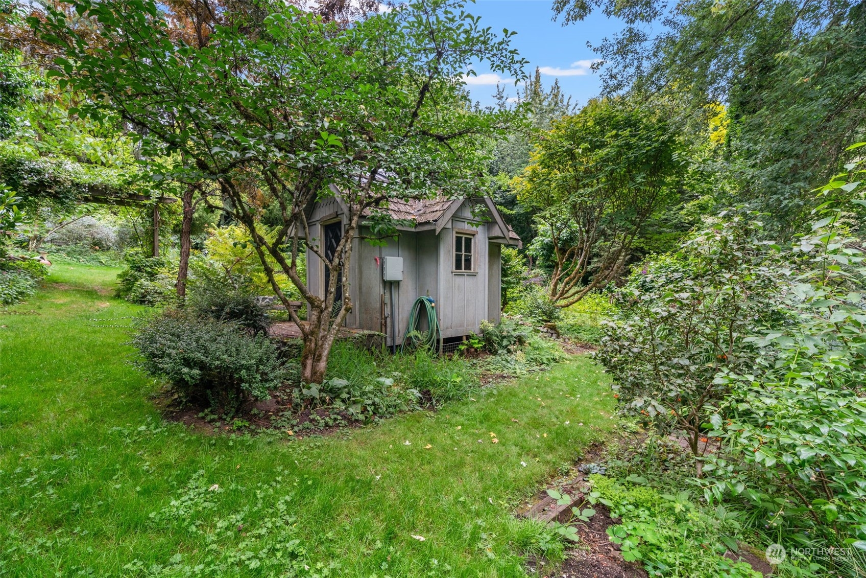 13210 Springhetti Road Snohomish, WA 98296 - Photo 14 of 38 a view of a house with a yard and plants