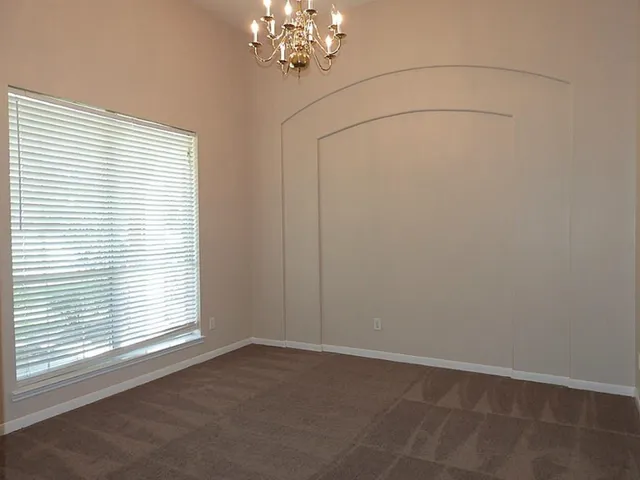 a view of a room with a window