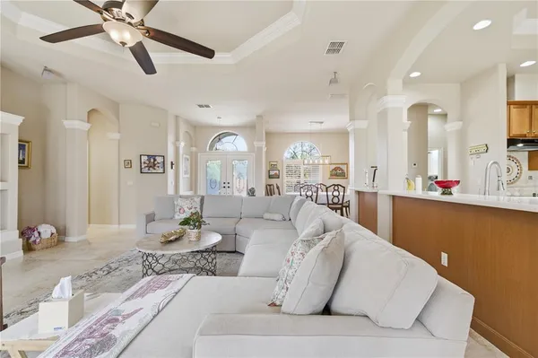 a open kitchen with lot of cabinets a sink and appliances