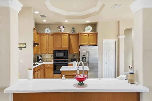 a spacious bathroom with a bathtub sink and mirror