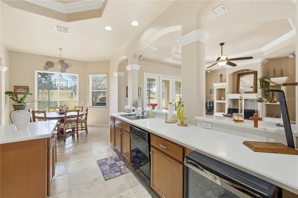 an open kitchen with a table and chairs in it