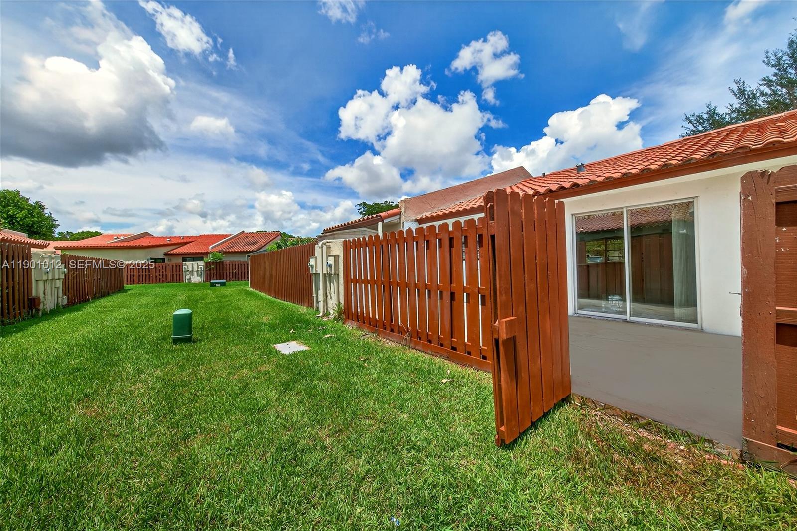 5913 Southwest 112th Terrace Cooper City, FL 33330 - Photo 26 of 31 a view of a house with backyard