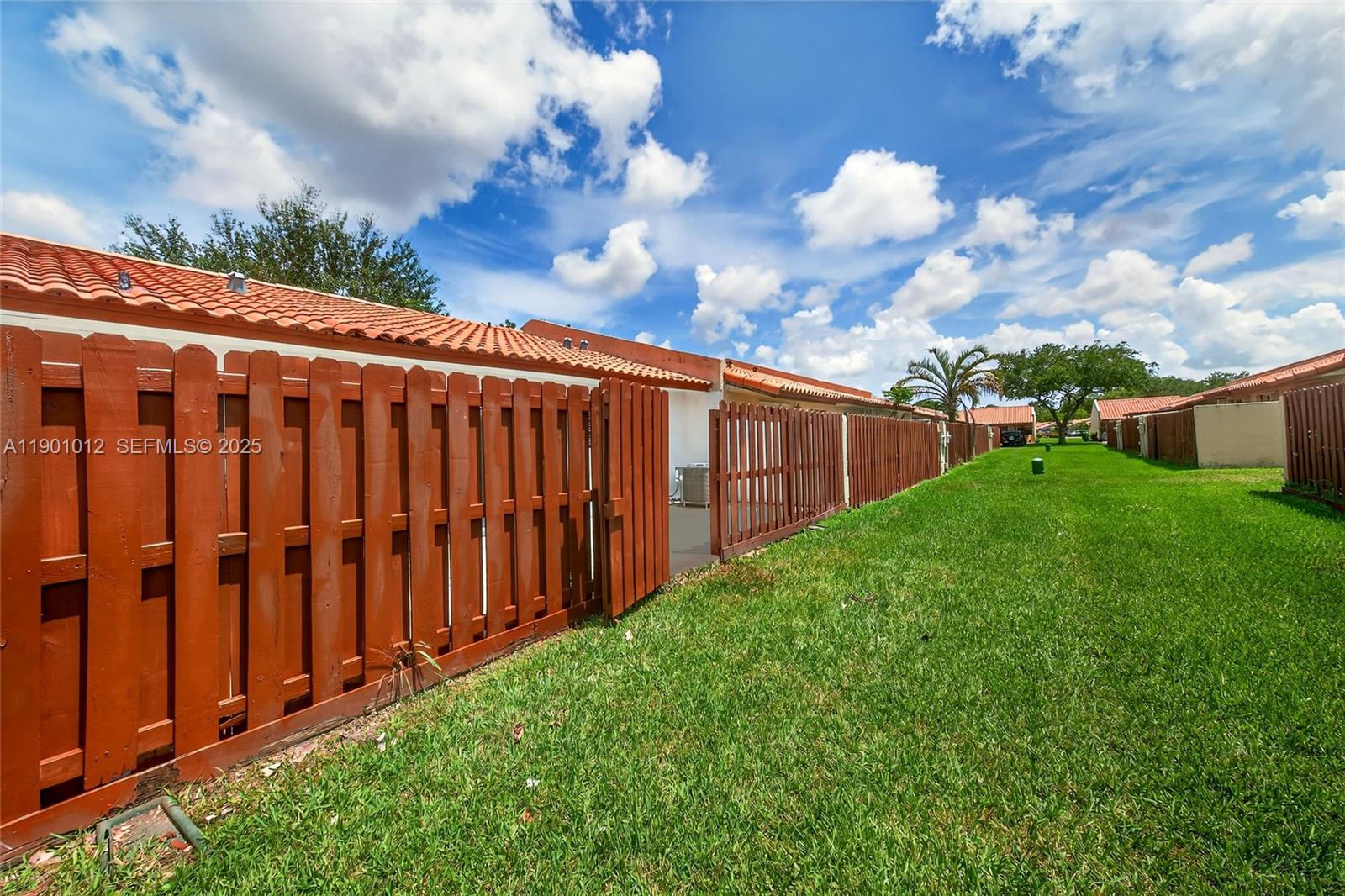 5913 Southwest 112th Terrace Cooper City, FL 33330 - Photo 27 of 31 a view of a backyard with pathway