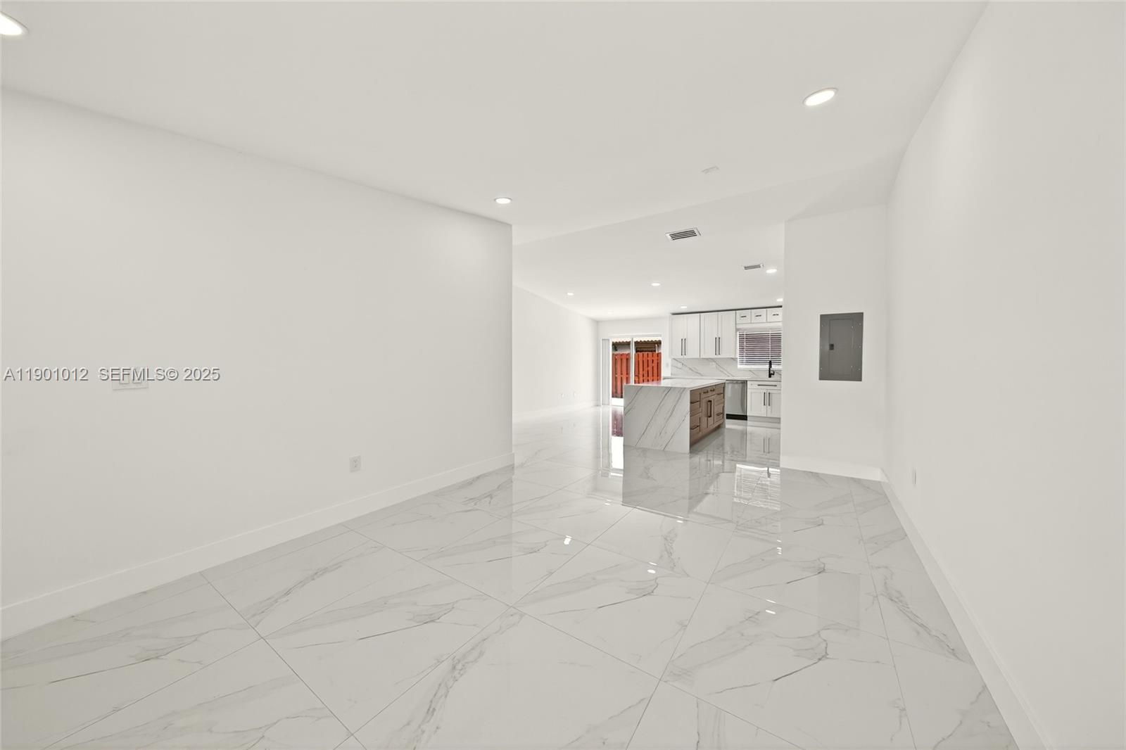 5913 Southwest 112th Terrace Cooper City, FL 33330 - Photo 9 of 31 a view of a livingroom with furniture and a chandelier