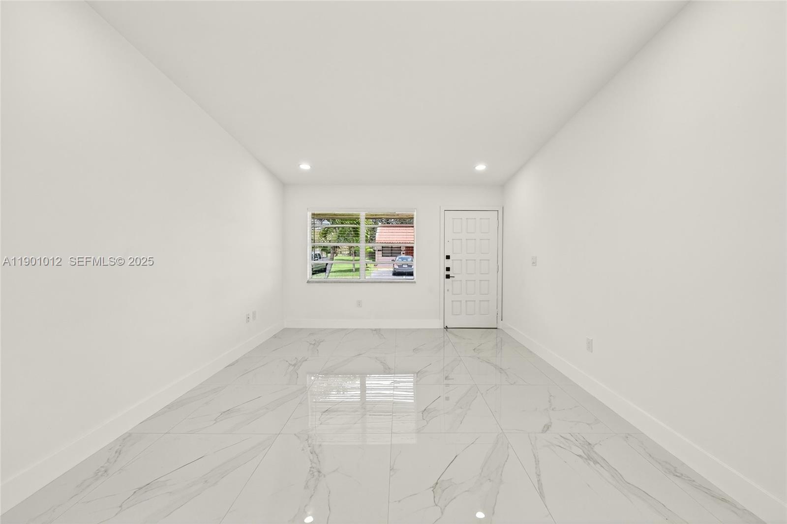 5913 Southwest 112th Terrace Cooper City, FL 33330 - Photo 10 of 31 an empty room with windows