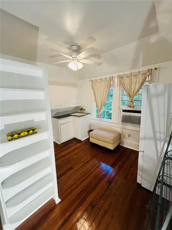 Undisclosed Address Gainesville, FL 32601 - Photo 8 of 25 a living room with furniture and a wooden floor