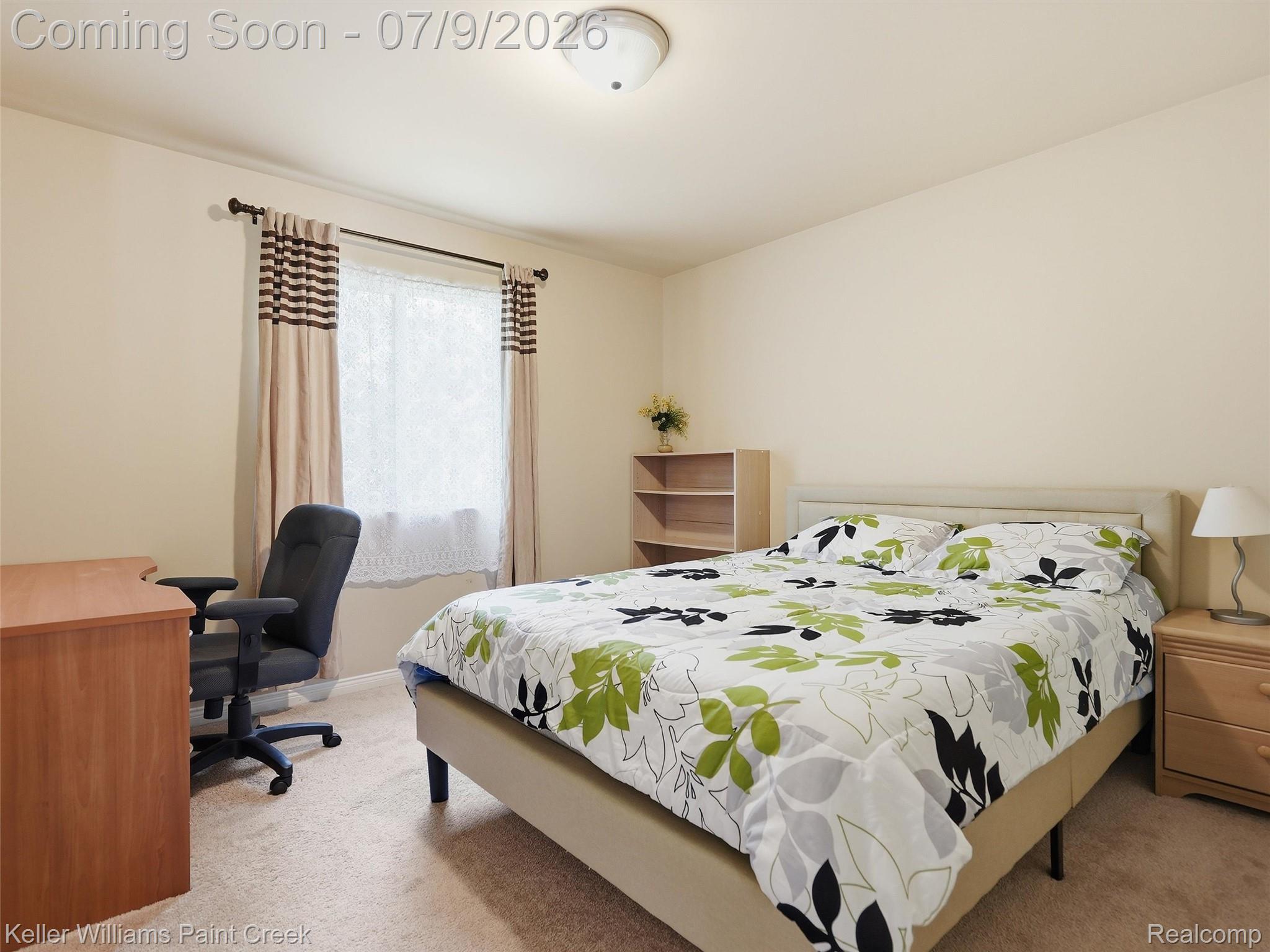 846 Monterey Ln. Rochester, MI 48307 - Photo 22 of 52 Neutral-toned bedroom featuring wall-to-wall carpeting and a window with drapes
