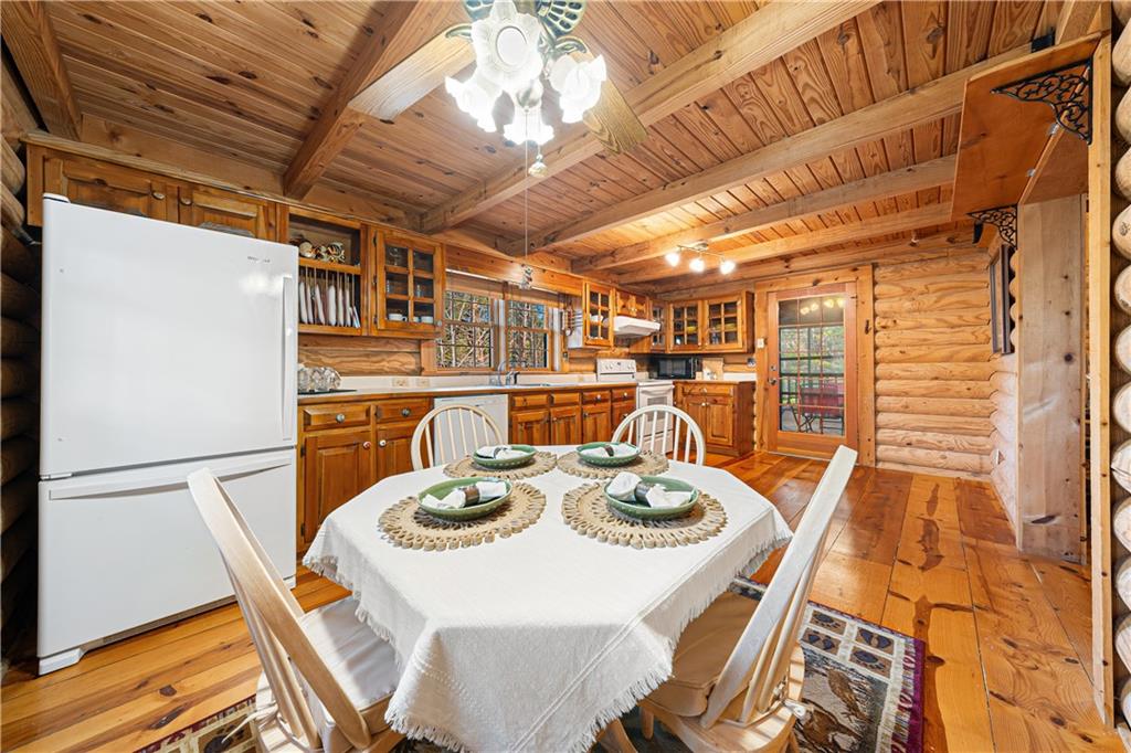 451 Pinecrest Road Sautee Nacoochee, GA 30571 - Photo 15 of 45 a table and chairs in a patio