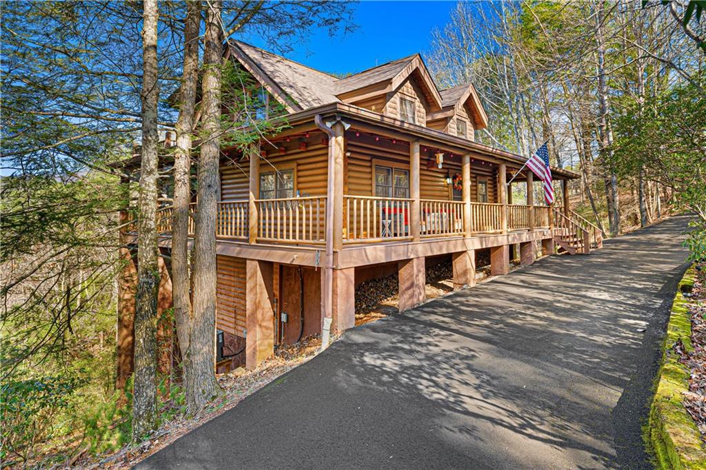 451 Pinecrest Road Sautee Nacoochee, GA 30571 - Photo 2 of 45 a view of a house with a yard