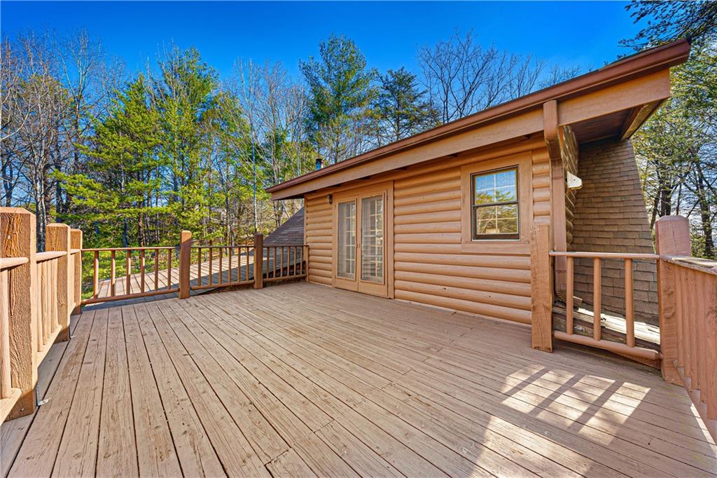451 Pinecrest Road Sautee Nacoochee, GA 30571 - Photo 30 of 45 a view of a house with wooden deck