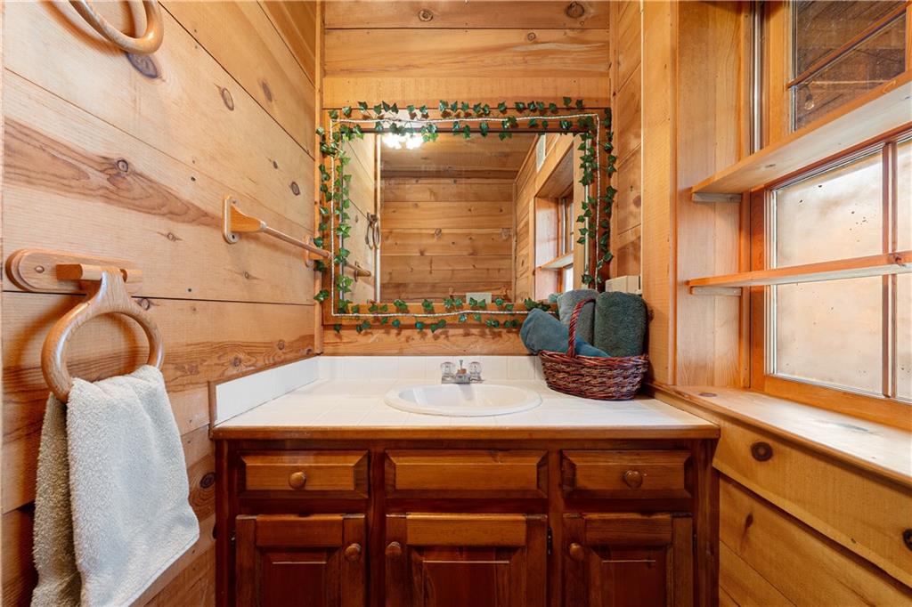 451 Pinecrest Road Sautee Nacoochee, GA 30571 - Photo 34 of 45 a room with a table chairs and a window
