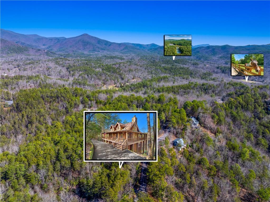 451 Pinecrest Road Sautee Nacoochee, GA 30571 - Photo 41 of 45 a view of a wooden house with a yard and mountain view