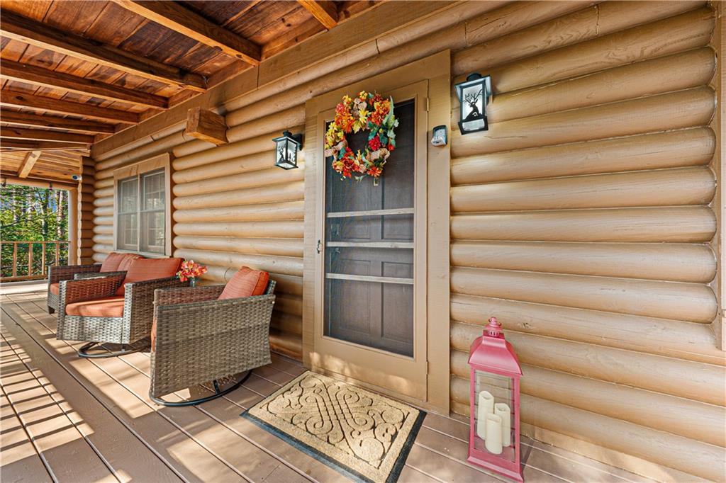 451 Pinecrest Road Sautee Nacoochee, GA 30571 - Photo 6 of 45 a living room with furniture and a gate